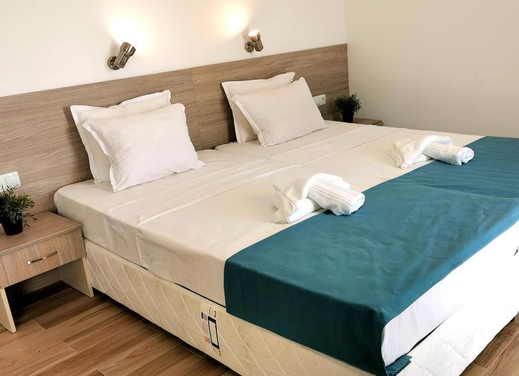 Family Quadruple Room, Balcony, Courtyard View | In-room safe, desk, laptop workspace, free WiFi