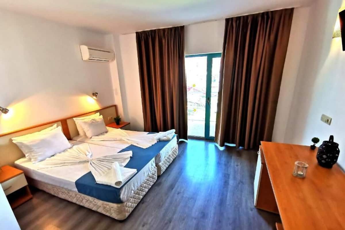 Double Room, Balcony, Courtyard View | In-room safe, desk, laptop workspace, free WiFi