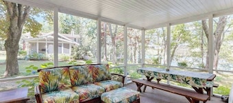 Newly updated lakefront cottage with screened porch, large yard & kayaks