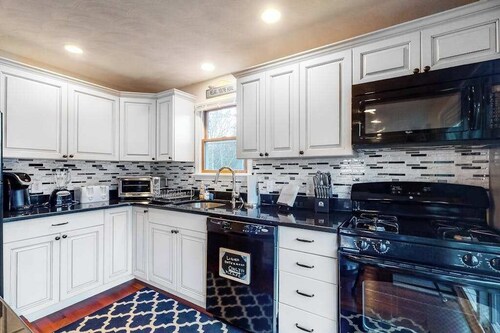 Wonderful three-story home with lovely decks, firepit, fast WiFi & washer/dryer