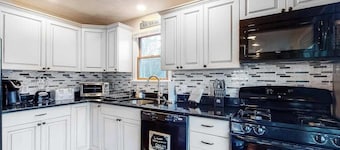 Wonderful three-story home with lovely decks, firepit, fast WiFi & washer/dryer