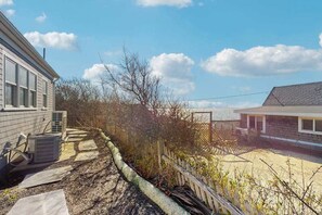 Property grounds - Newly built, bayview house steps from the beach with spacious deck, W/D & grill (North Eastham)