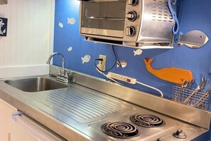 Fridge, microwave, stovetop, coffee/tea maker