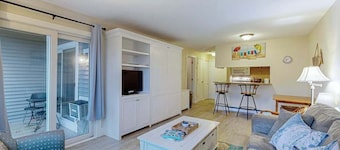 Cozy condo with golf course view, balcony, W/D, AC, & games