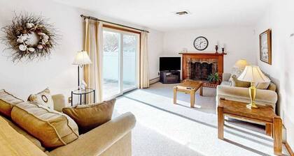 Single-story home with fenced yard, deck & great location near town/beaches