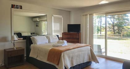 Cozy, Ground-Floor Getaway w/ Free WiFi, a Kitchen, Shared Pool, & Private Patio