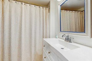 Shower, towels - Charming home, great location, A/C, games, W/D, deck, & grill, firepit (Marstons Mills)