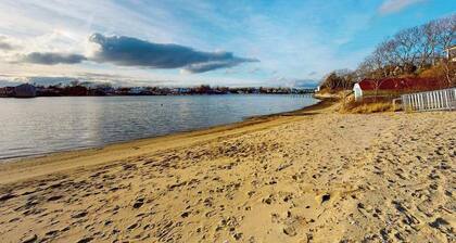 Inviting home + apartment near beach with furnished deck, yard, & grill
