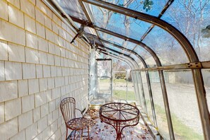 Outdoor dining - Renovated cottage steps from private beach with backyard, grill, bay views, AC (Bourne)