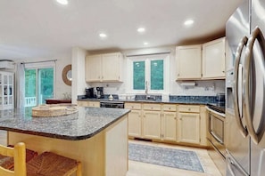 Fridge, microwave, oven, stovetop - Inviting dog-friendly home with furnished deck & firepit, near golf (East Falmouth)