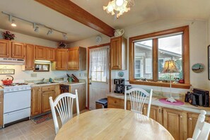 Fridge, microwave, oven, stovetop - Lakefront home with beach views, WiFi, gas grill & patio - near beach (Falmouth)