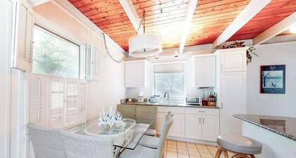 Summer home with expansive deck & wonderful location for beachgoers