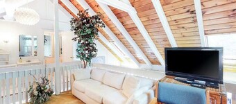 Summer home with expansive deck & wonderful location for beachgoers