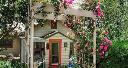 Historic cottage with patio, games, walk to beach & dog-friendly fenced yard