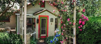 Historic cottage with patio, games, walk to beach & dog-friendly fenced yard