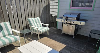 Historic cottage with patio, games, walk to beach & dog-friendly fenced yard