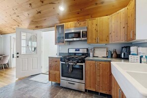 Fridge, microwave, oven, stovetop - Stylish island retreat with sunny interiors, wraparound deck, firepit & AC (Oak Bluffs)