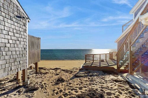 Cozy coastal condo steps from the beach with private deck & two parking spots