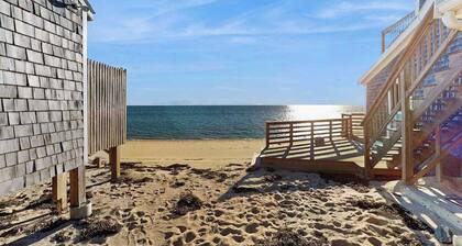 Cozy coastal condo steps from the beach with private deck & two parking spots