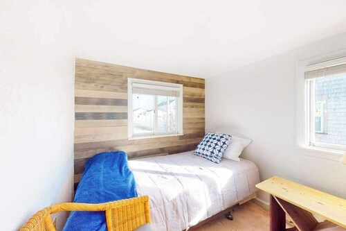 Dog-friendly coastal home steps from beach with grill, firepit, & washer/dryer