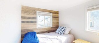 Dog-friendly coastal home steps from beach with grill, firepit, & washer/dryer