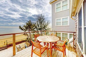 Outdoor dining - Renovated beachfront condo on Cape Cod Bay with deck & gorgeous views (Provincetown)