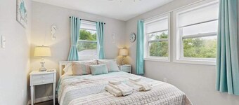 Private suite with roof deck, near golf, bus stop, shops, and trails