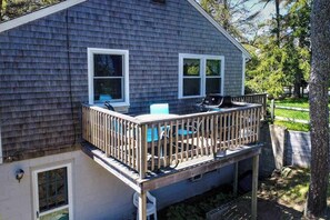 Outdoor dining - Charming home steps to beach, includes 2 full units with patio, grill, & views (Orleans)