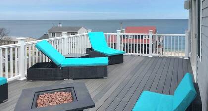 Comfortable home with rooftop deck, beach & water views, W/D, & central AC