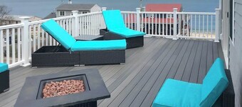 Comfortable home with rooftop deck, beach & water views, W/D, & central AC