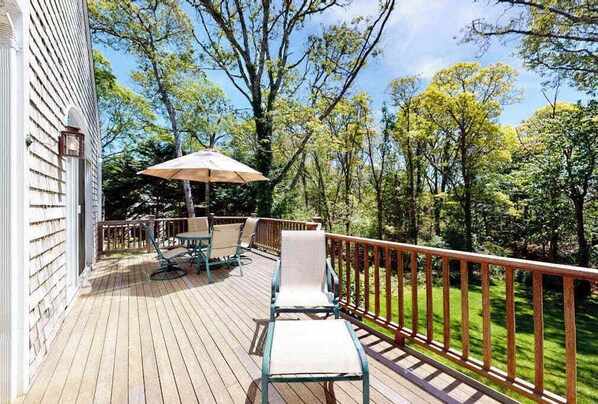 Outdoor dining - Spacious home with huge deck & tree-lined yard, grill, & WiFi - great location (Orleans)