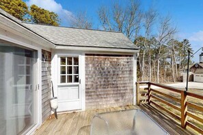 Terrace/patio - Renovated, river view home with yard games - walk to town dock & beach (West Dennis)