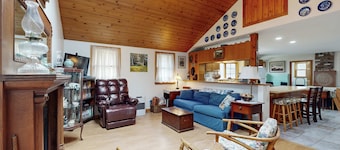 Quaint home across from bike paths with large furnished deck, grill, & W/D