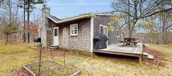 Quaint home across from bike paths with large furnished deck, grill, & W/D