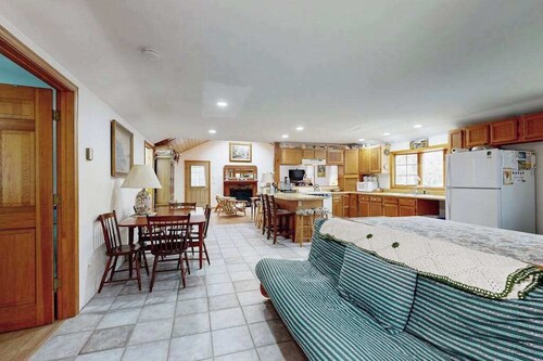 Quaint home across from bike paths with large furnished deck, grill, & W/D