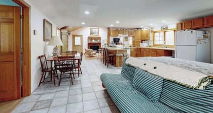 Quaint home across from bike paths with large furnished deck, grill, & W/D