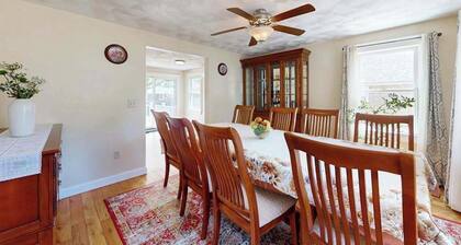 Charming coastal home with sunny rooms, private backyard, & walk to beach