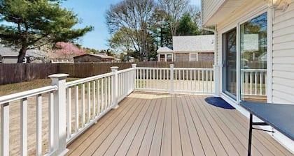 Charming coastal home with sunny rooms, private backyard, & walk to beach