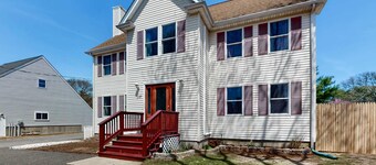 Charming coastal home with sunny rooms, private backyard, & walk to beach