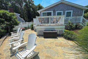 Terrace/patio - Peaceful marshview escape with large sunroom, AC, outdoor firepit & dog friendly (Pocasset)