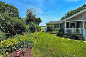 Exterior - Peaceful marshview escape with large sunroom, AC, outdoor firepit & dog friendly (Pocasset)