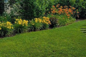 Property grounds - Peaceful marshview escape with large sunroom, AC, outdoor firepit & dog friendly (Pocasset)