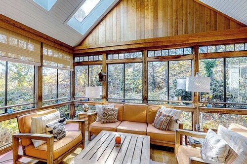 Dog-friendly, hilltop home near the beach with hot tub, firepit & gorgeous porch