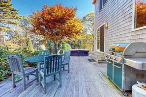 Outdoor dining - Dog-friendly, hilltop home near the beach with hot tub, firepit & gorgeous porch (Truro)