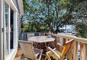 Outdoor dining - Colorful, family-friendly condo close to the ocean & renovated interior (Provincetown)