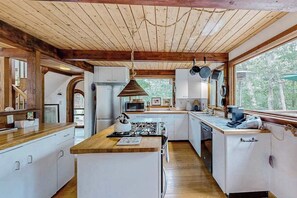 Fridge, microwave, oven, stovetop - Nana’s Treehouse | House with spacious deck, grills, outdoor shower & W/D (West Tisbury)