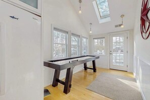 Games room - Remodeled cape w/ outdoor kitchen & yard: near Seagull Beach, local attractions (West Yarmouth)