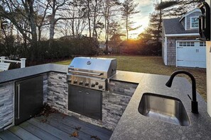 Property grounds - Remodeled cape w/ outdoor kitchen & yard: near Seagull Beach, local attractions (West Yarmouth)