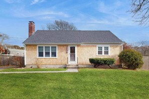 Exterior - Cozy coastal home close to the bay with large deck, fenced yard, AC & beach gear (West Yarmouth)