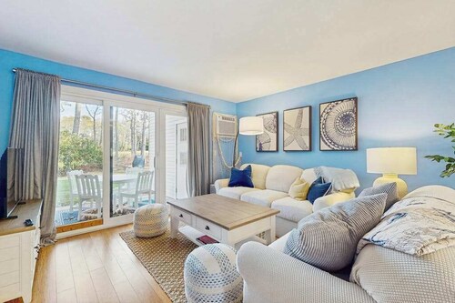 Modern fairway condo with open layout, private patio, AC & washer/dryer